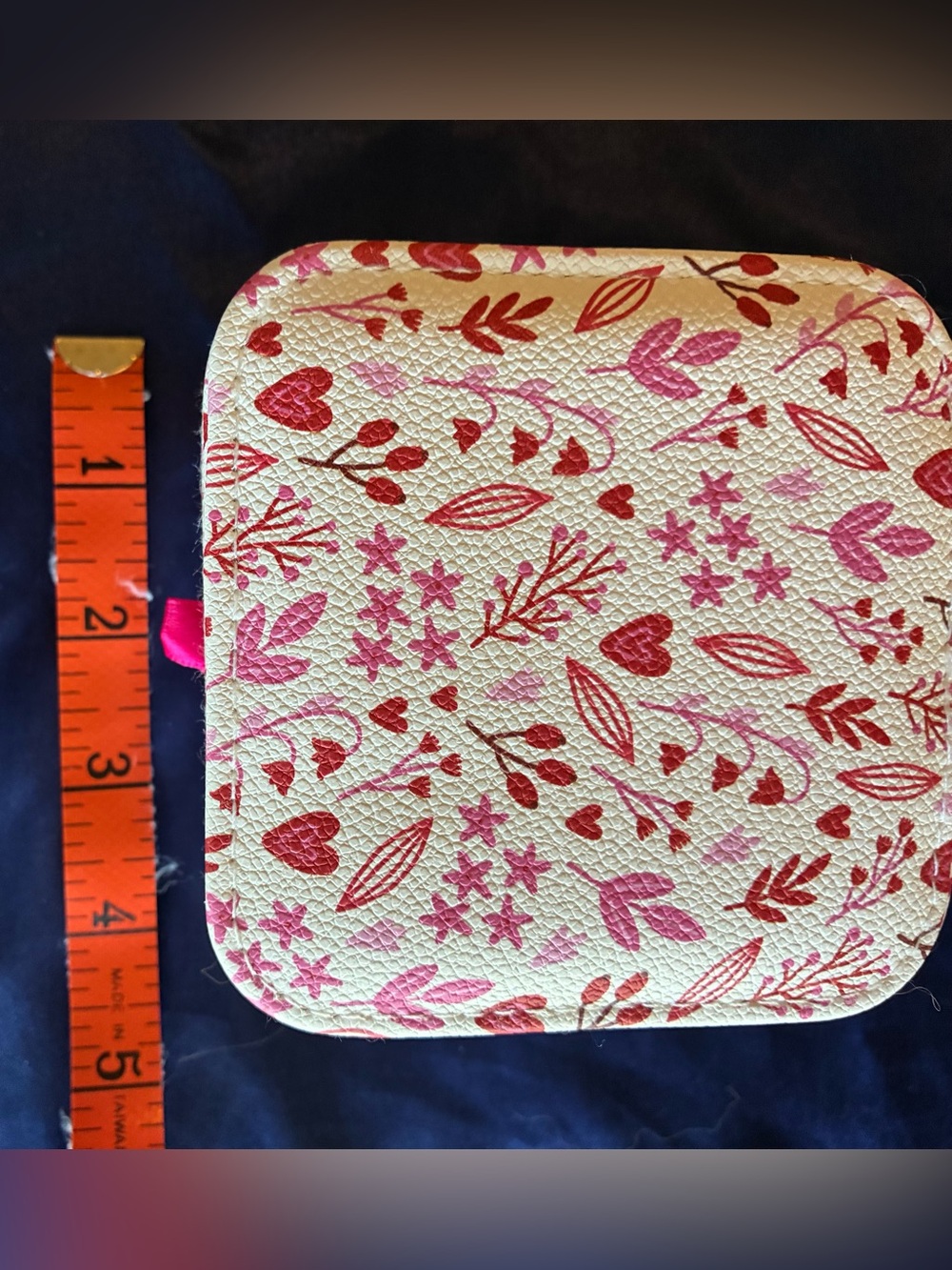 Stylish jewelry case whether for travel or at home this pink and red floral hear